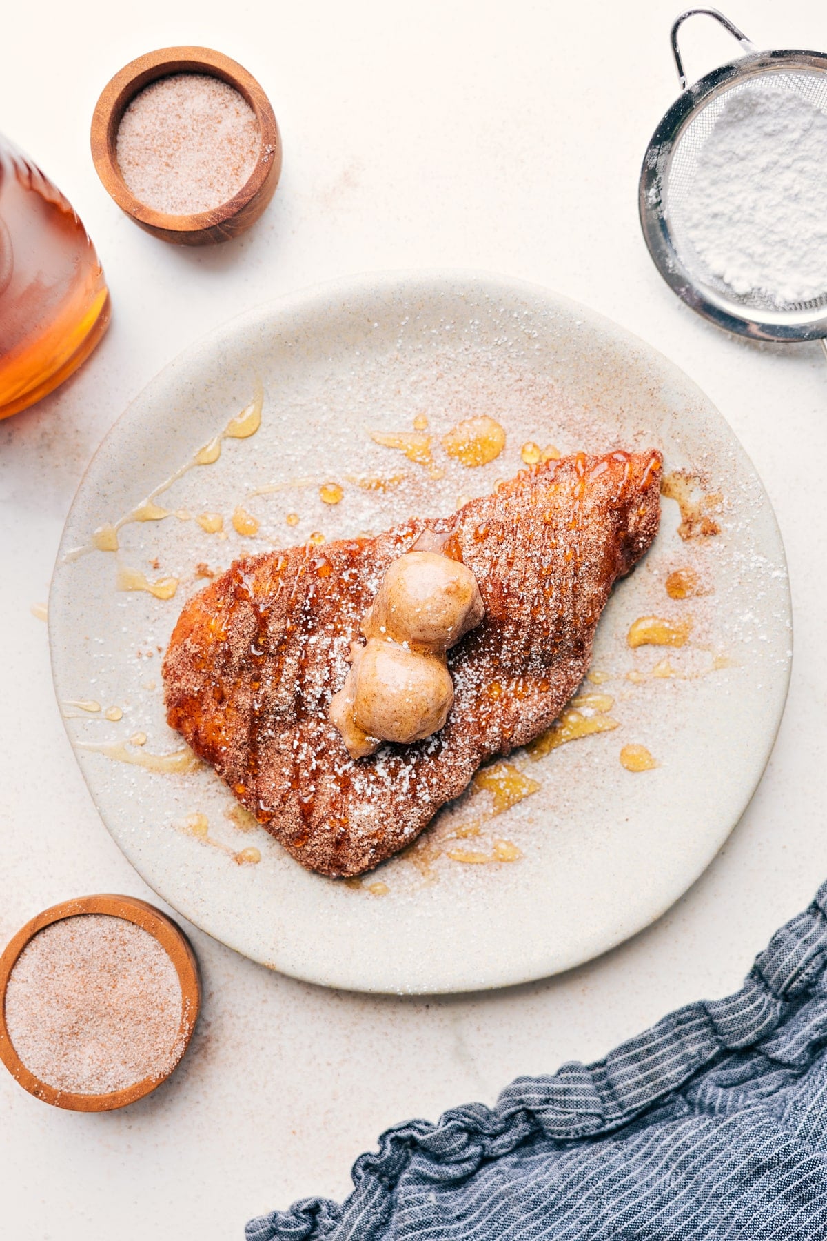 Utah Scones are unlike scones anywhere else in the world! Unlike European scones that are served with clotted cream and tea or American biscuits, these scones are deep-fried pieces of a puffy flatbread that are enjoyed with a sprinkle of powdered sugar, honey, and butter. Recipe via ChelseasMessyApron #treat #dessert #best #quick #easy #simple #fried #frybread #utah #scones