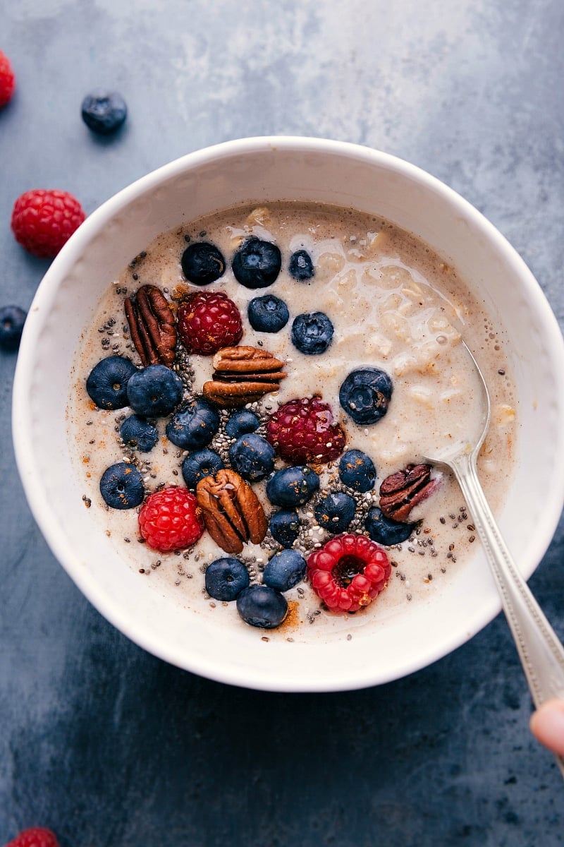 Oatmeal base with luscious fresh berries and crunchy pecans, a wholesome breakfast.