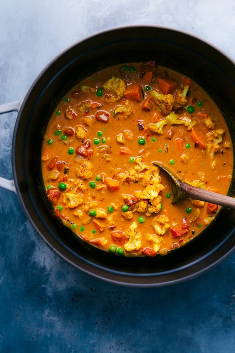 Overhead view of a pot of Vegetable Curry, ready to serve.