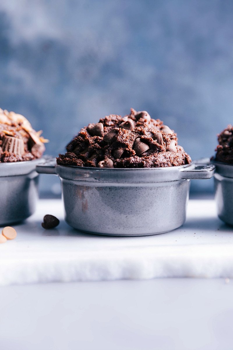 An overflowing bowl of rich, edible brownie batter, generously studded with chocolate chips.