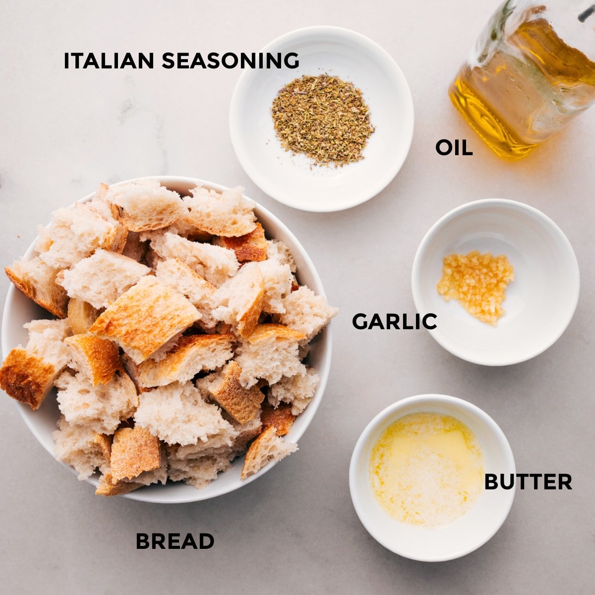 The bread is seasoned and roasted to add to the salad.