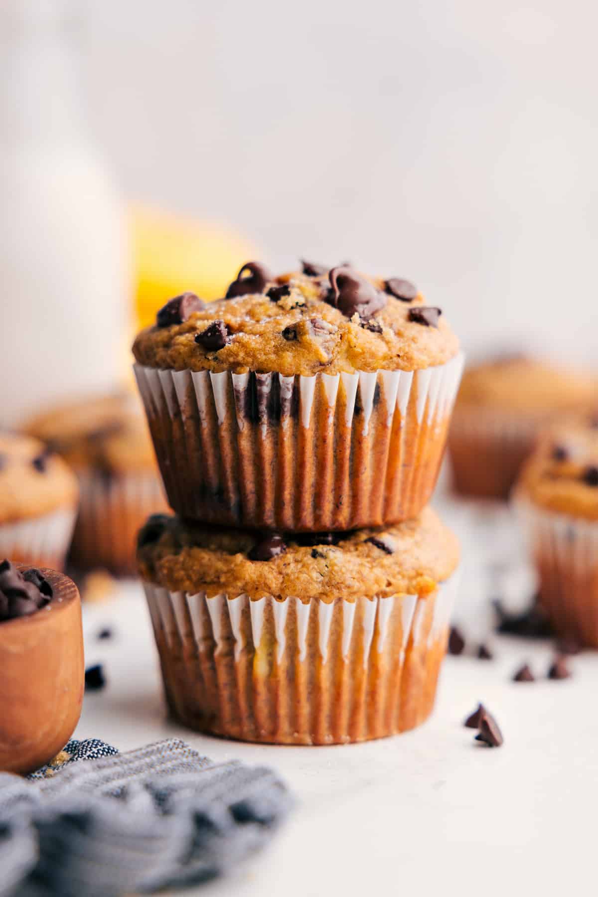 Freshly Baked Banana Peanut Butter Muffins Banana Peanut Butter Muffins stacked on top of each other and ready to enjoy.