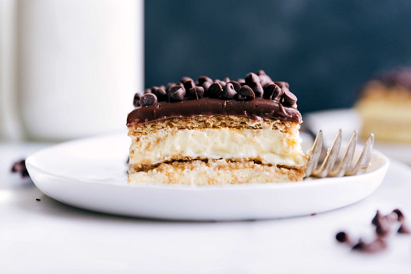 A delicious and gorgeous slice of chocolate eclair cake ready to be enjoyed.