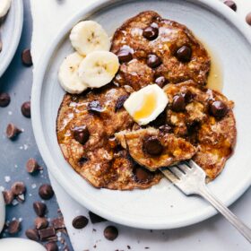 Finished breakfast, warm and topped with butter and fresh banana slices.