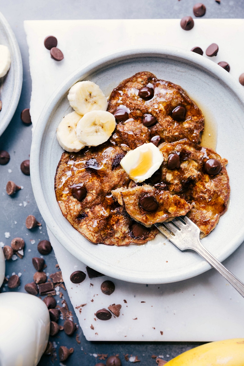 Finished breakfast, warm and topped with butter and fresh banana slices.