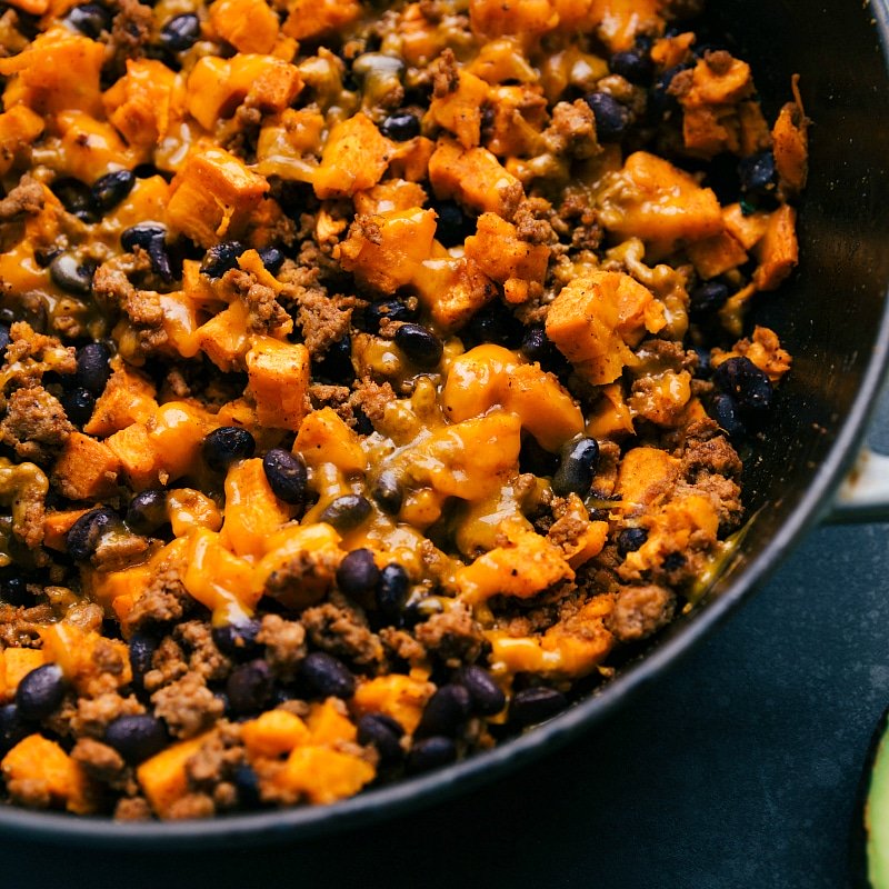 Generous serving of ground turkey sweet potato skillet, hot and freshly prepared, inviting and ready to savor.