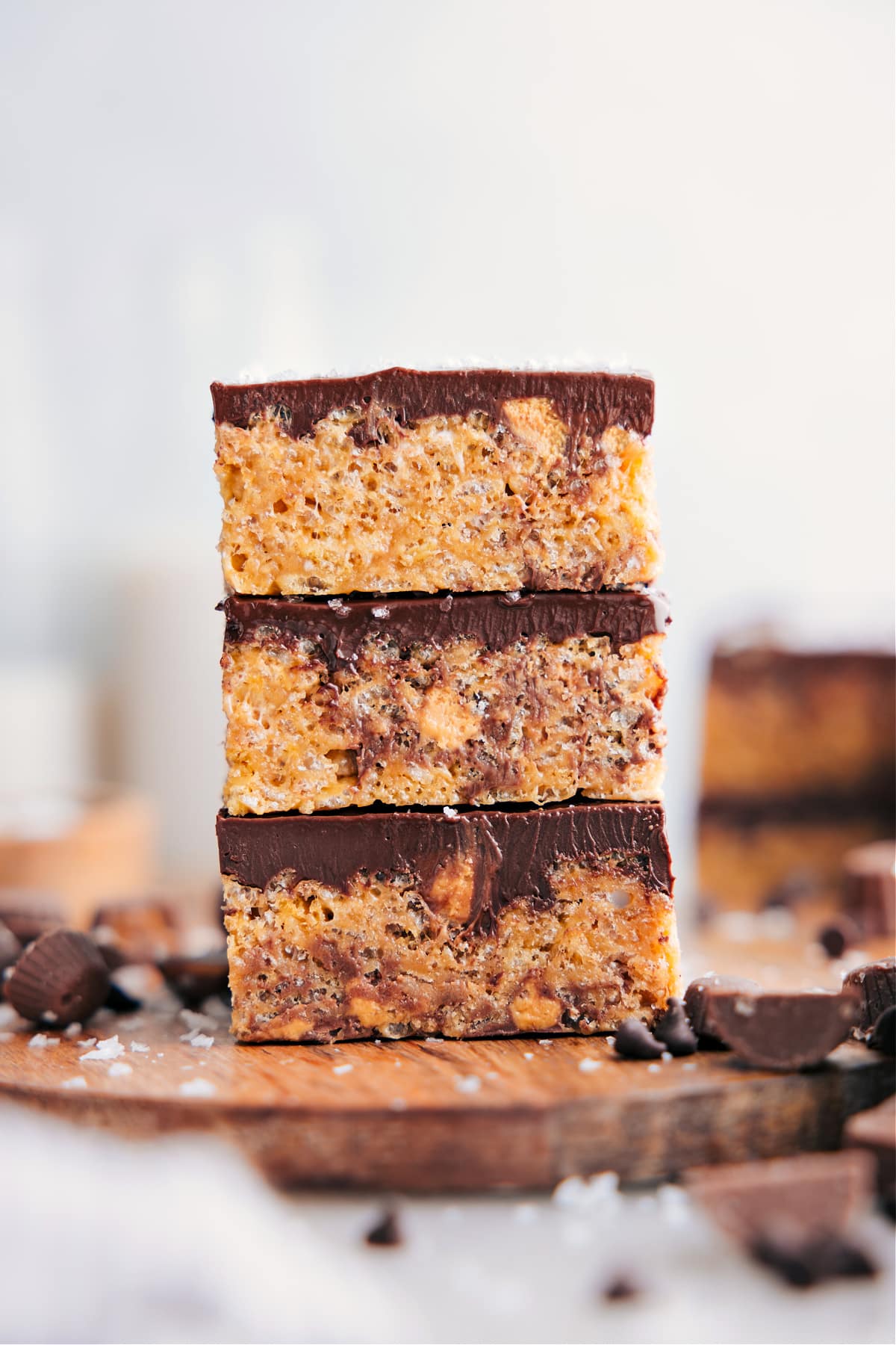 The Best Peanut Butter Rice Krispie Treats Recipe Peanut Butter Rice Krispie Treats cut into squares and stacked on top of each other.