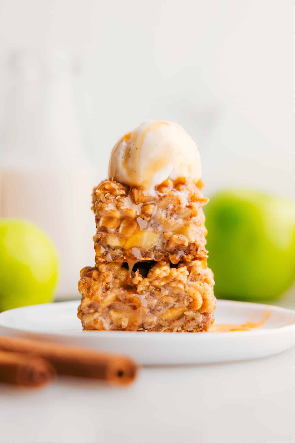 The Best Apple Pie Bars Recipe Stack Apple Pie Bars on top of each other.