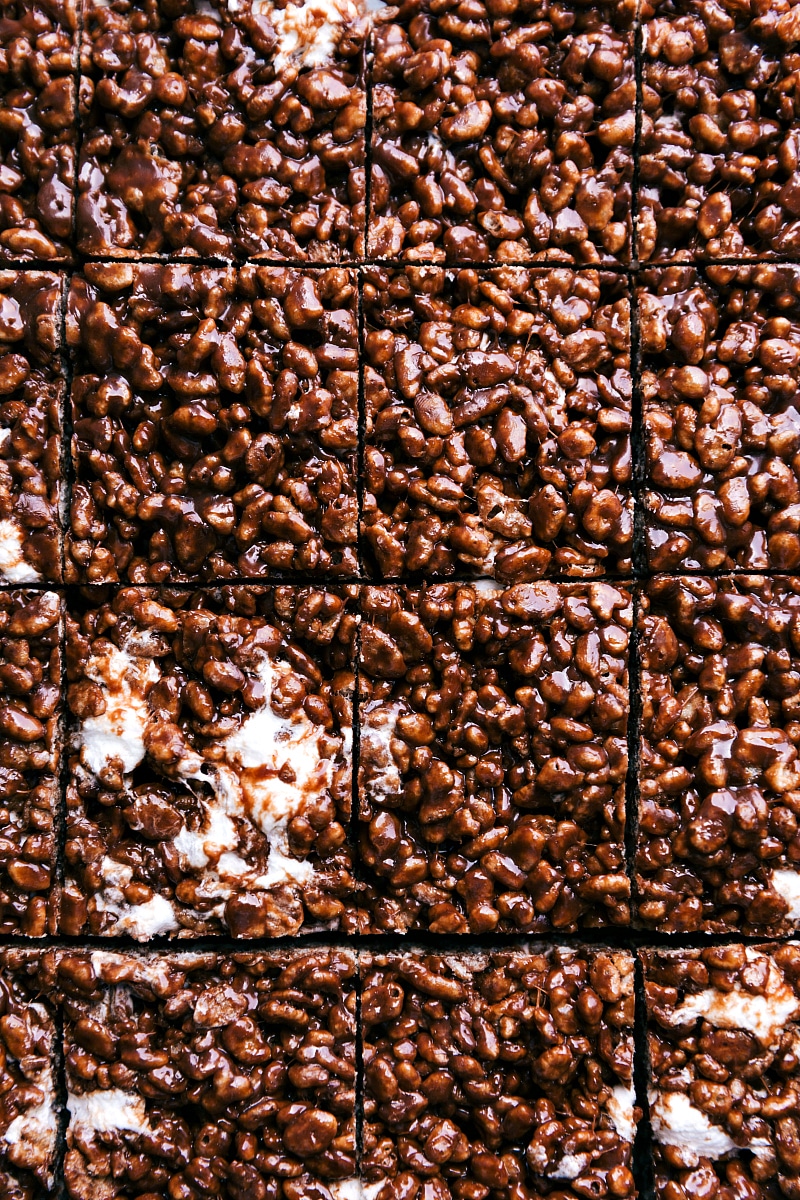 Overhead image of Chocolate Rice Krispie Treats, cut into squares.