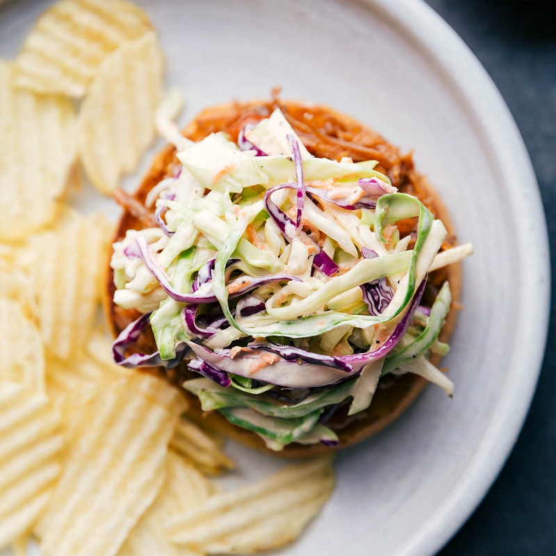 Overhead image of Coleslaw on a pulled pork sandwich.