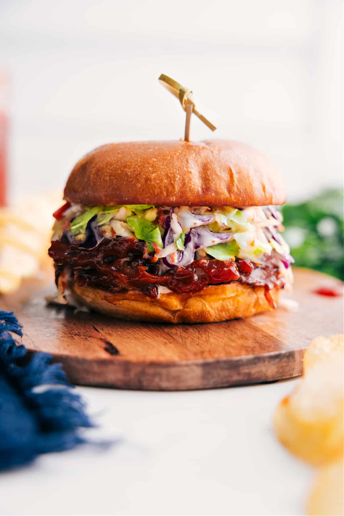 Ready-to-Eat Crockpot BBQ Pulled Pork Sandwich Stuffed with Flavorful Ingredients Pulled Pork Sandwich Recipe on a tray ready to be enjoyed.
