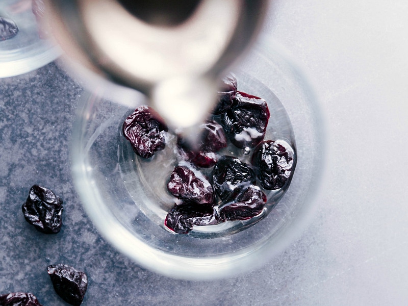 Image of the juice being added to the cup of cherries