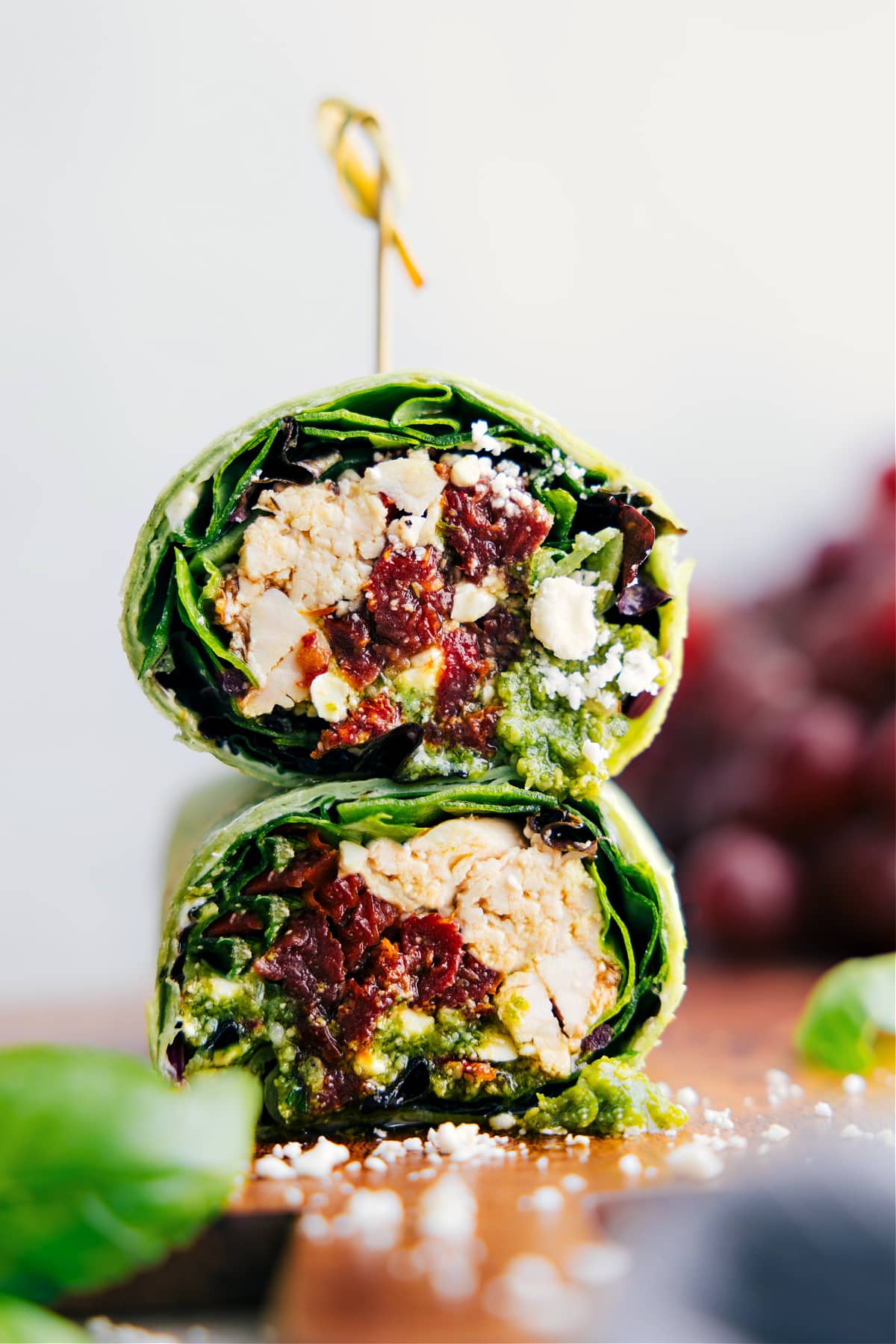 Mediterranean Wrap cut in half and stacked on top of each other.