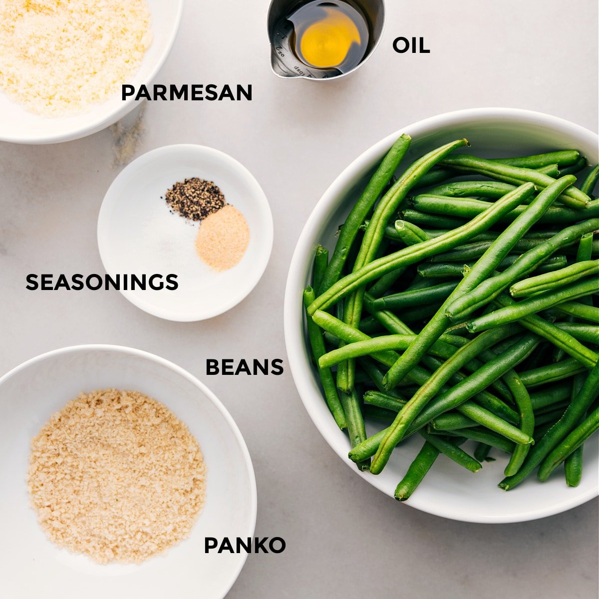 Ingredients are prepped for easy assembly: beans, panko, seasonings, oil, and parmesan.