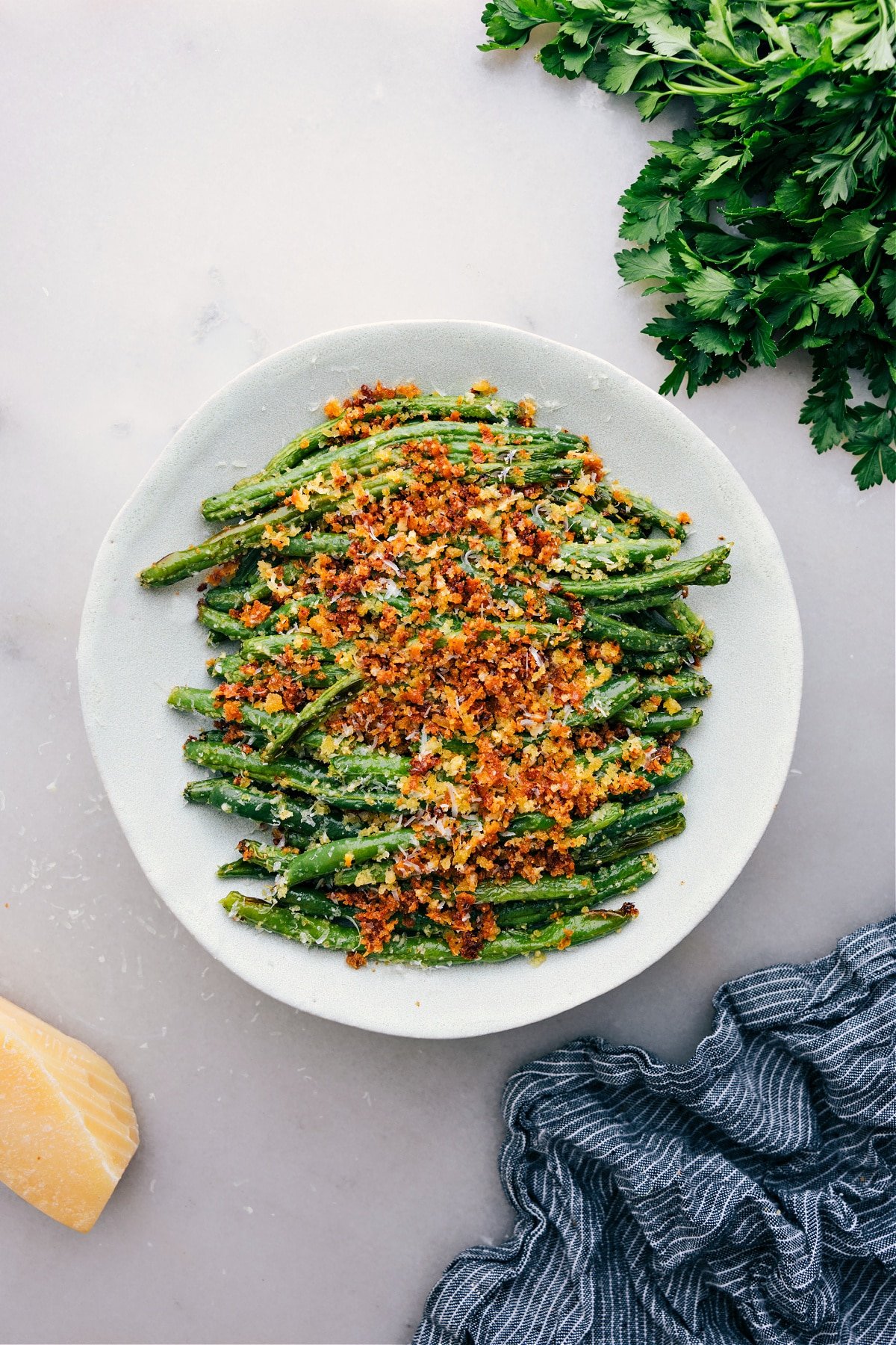 Freshly roasted green beans straight from the oven, topped with panko and parmesan.