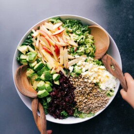Brussels sprout salad in a bowl, adorned with delicious and healthy toppings.