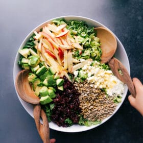 Brussels sprout salad in a bowl, adorned with delicious and healthy toppings.