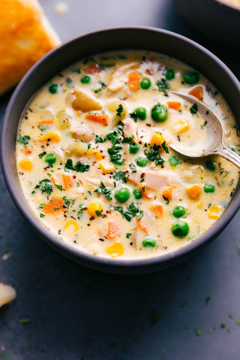 Up-close overhead image of Chicken Pot Pie Soup, about the be eaten.