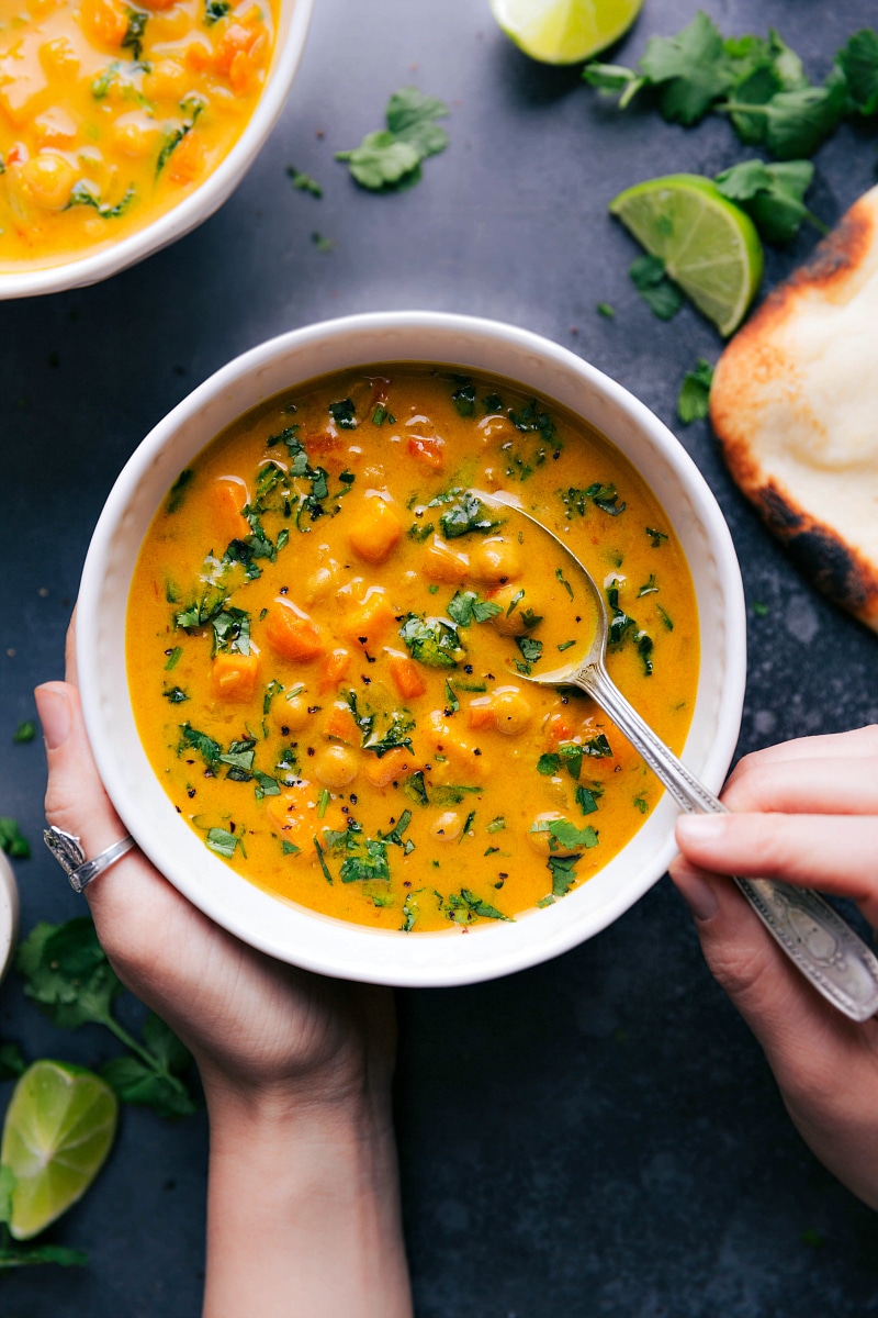 Overhead view of a bowl of Sweet Potato Coconut Curry Soup.