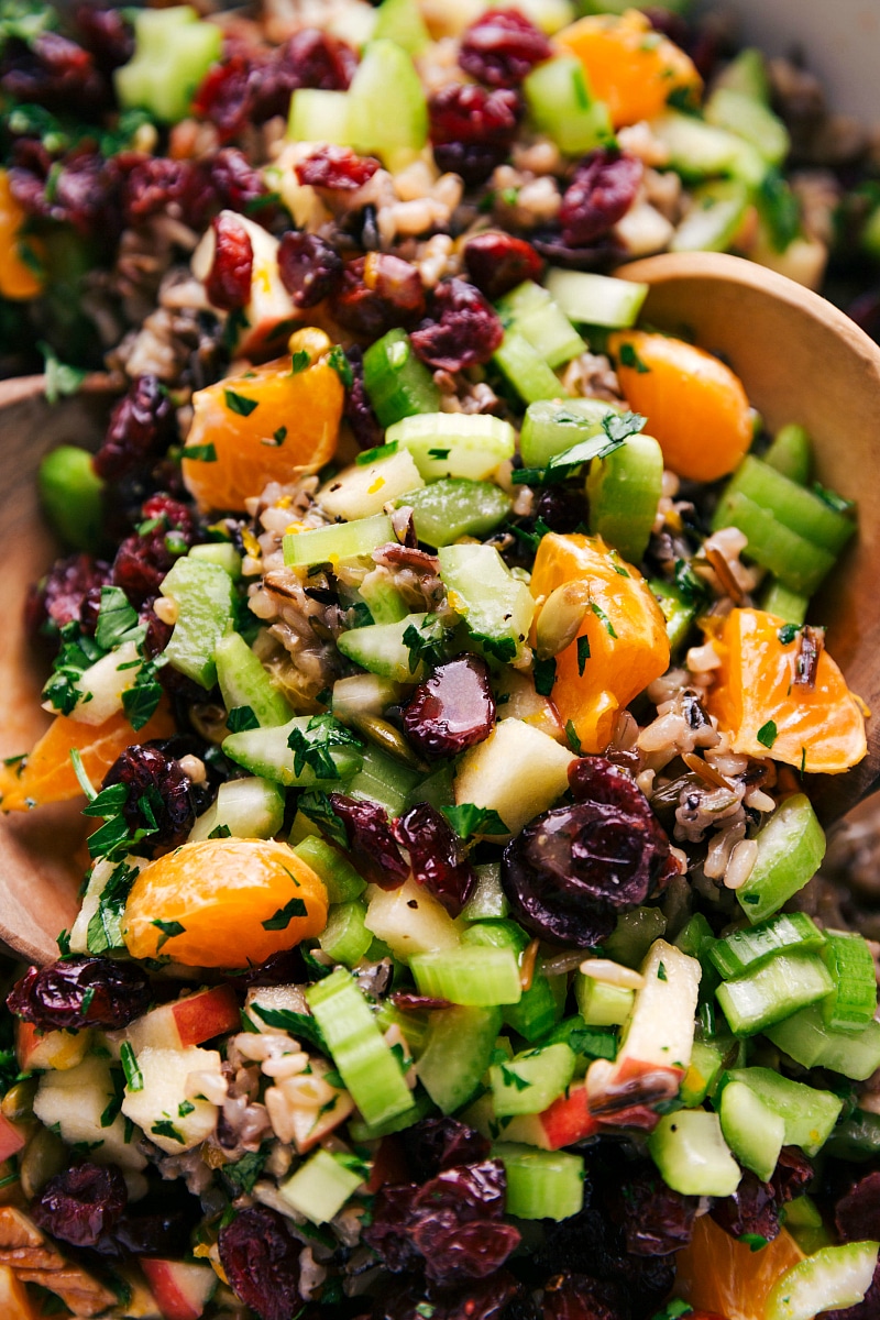Wild rice pilaf baked with fresh vegetables and herbs, bursting with flavor and wholesome ingredients.