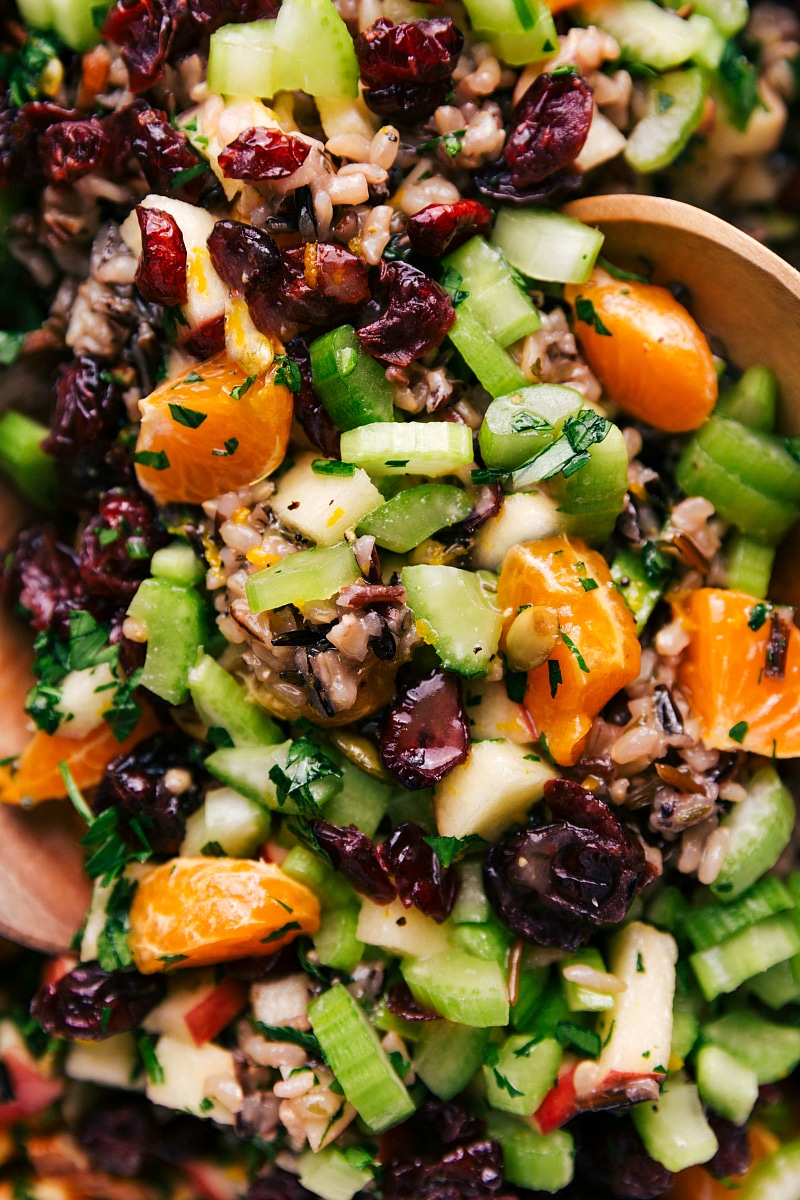 The finished wild rice pilaf recipe with cranberries and orange, fresh herbs, and abundant flavor.