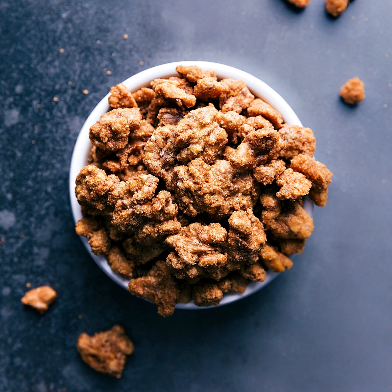 Overhead view of a bowl of Candied Walnuts.