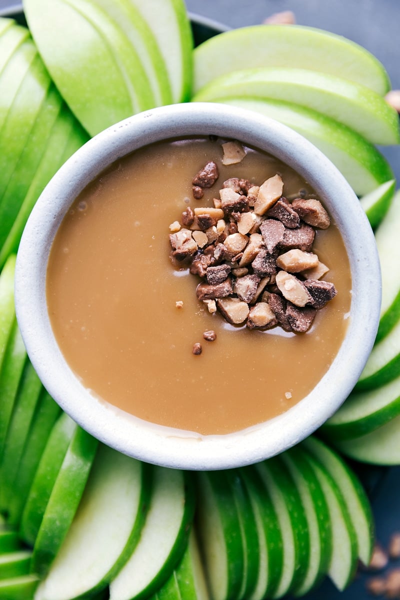 Caramel Sauce with Chopped Heath Bars Bowl of caramel sauce topped with chopped Heath bars, ready to be enjoyed.