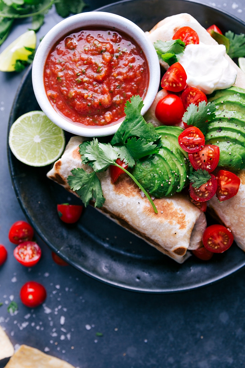 Healthy burritos topped with fresh vegetables, ready to be enjoyed.