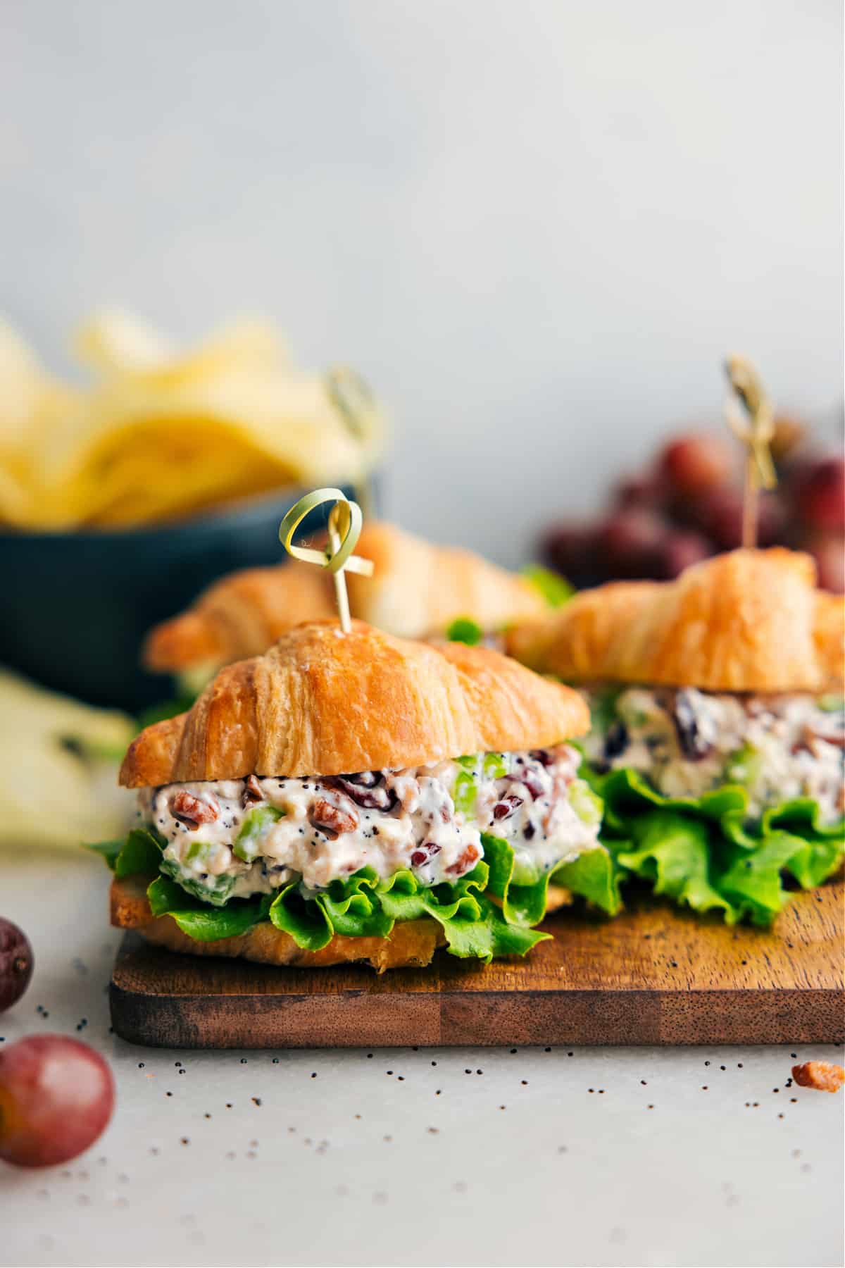 Chicken Salad recipe assembled in a croissant with lettuce.