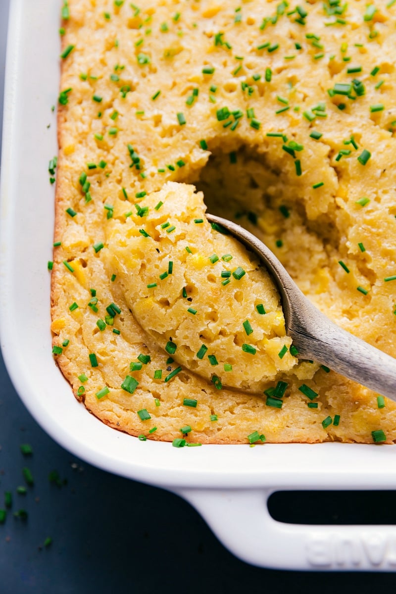 Overhead image of Corn Casserole with a spoonful being taken out of it