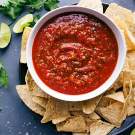 Big bowl of salsa with chips.