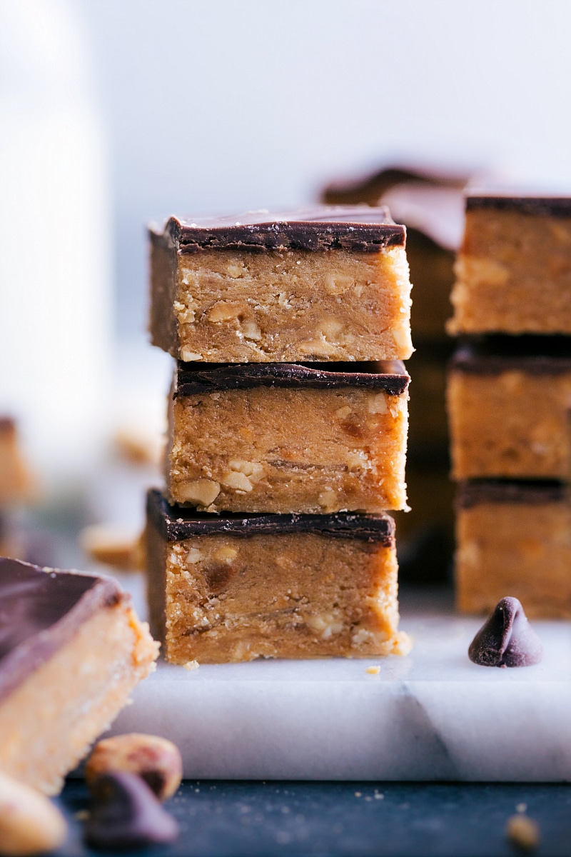 View of several pieces of Buttercrunch Candy stacked on a board.