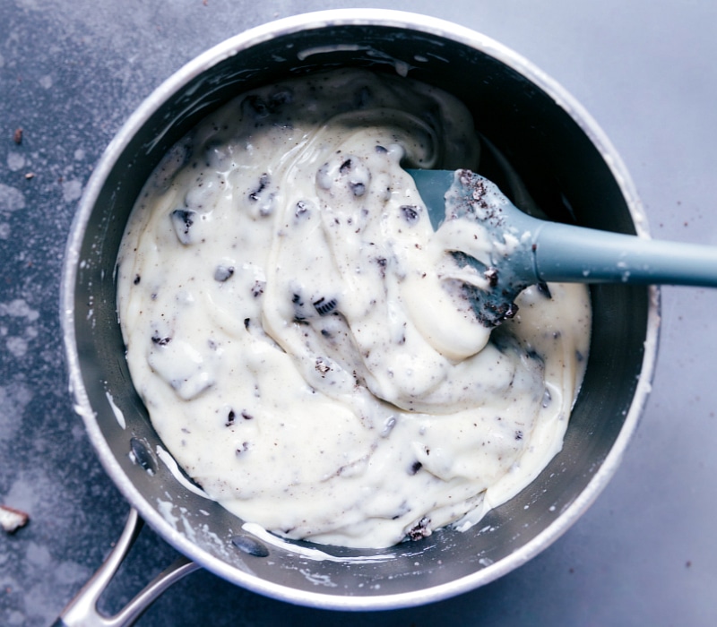 Overhead view of the cookies added into the fudge mixture.