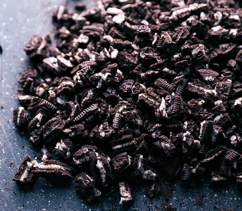 A pile of roughly chopped Oreos, which will be part of this fudge recipe.
