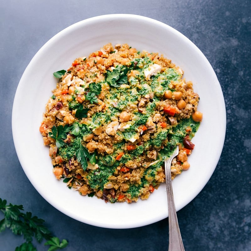 Overhead image of Quinoa Pilaf with the sauce over top ready to be served.