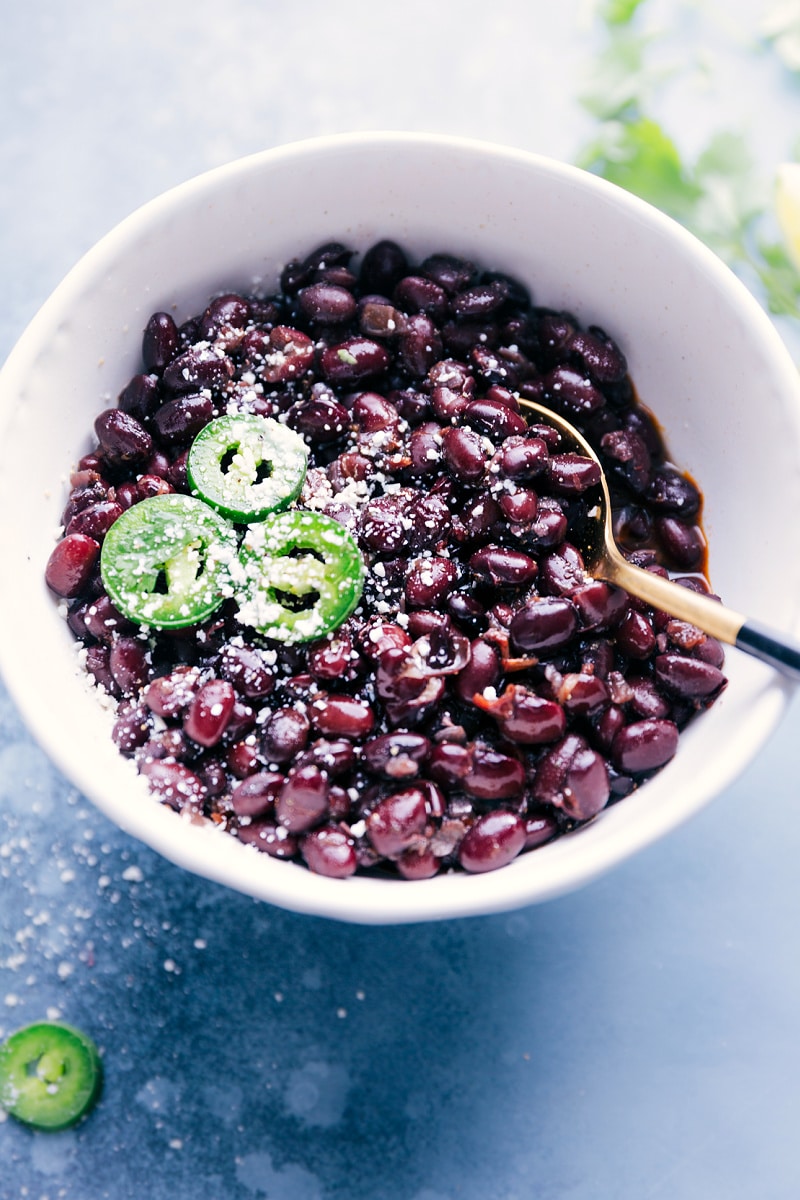 Overhead view of a bowl of Black Beans, ready to eat.