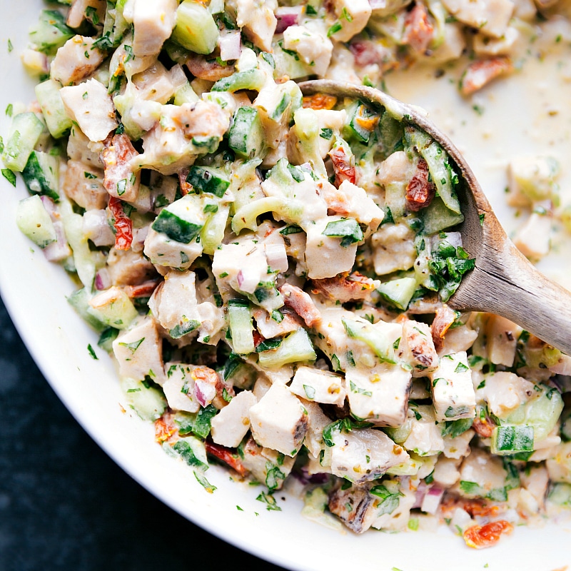 Closeup view of the Greek Chicken Salad mixture, ready to be added to the pita.