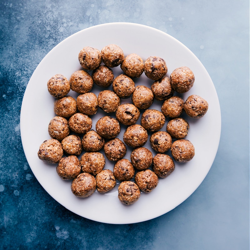 View of a plate filled with Oatmeal Energy Balls.