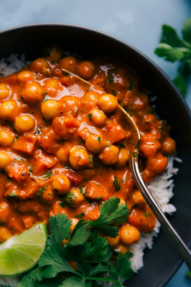 Close-up view of a plate of Chickpea Curry over basmati rice.