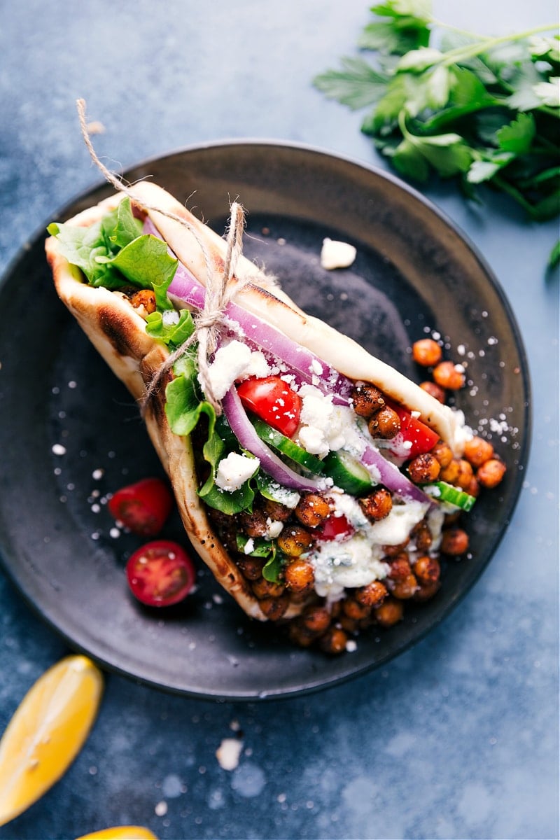 Overhead view of a filled pita bread for Vegetarian Gyros.