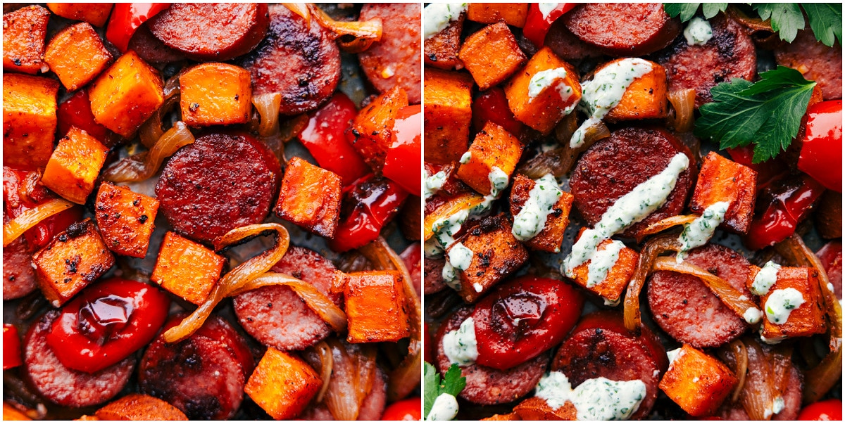 Freshly baked sweet potato and sausage on a sheet pan, with rich, homemade sauce drizzled on top, straight from the oven.