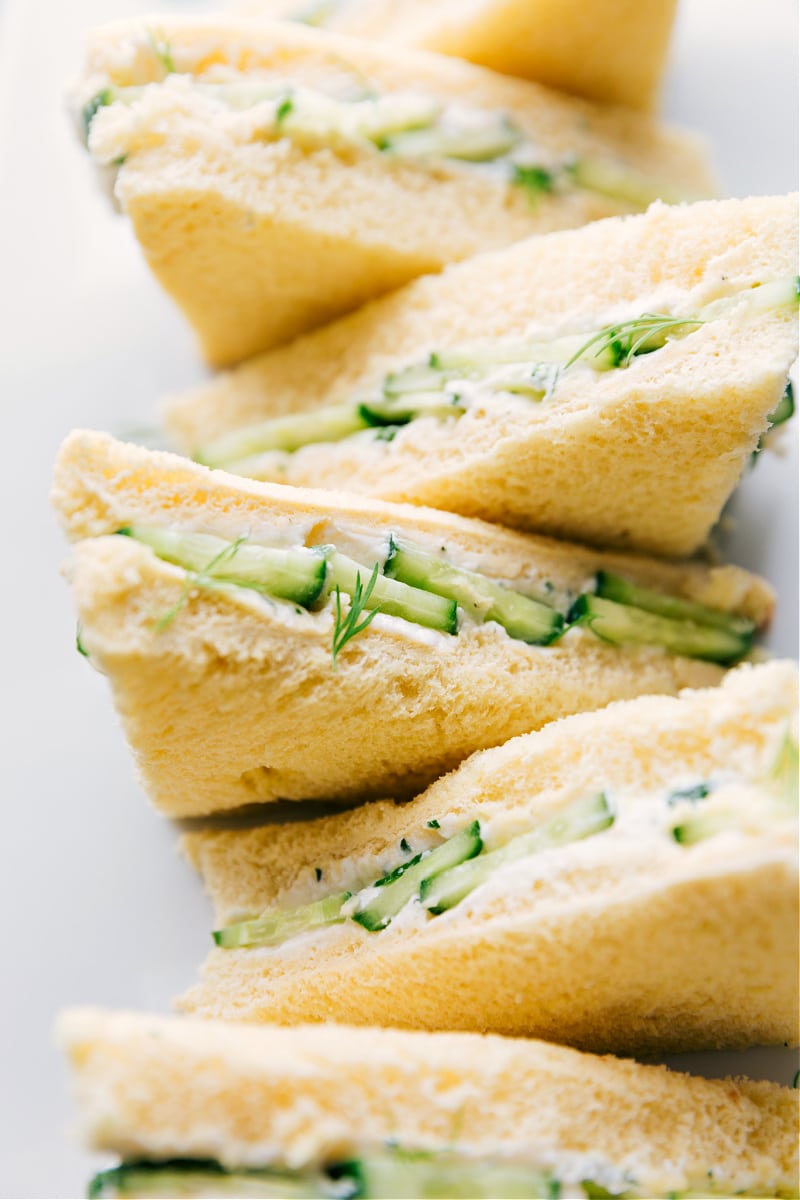 Cucumber Sandwiches served on a platter.