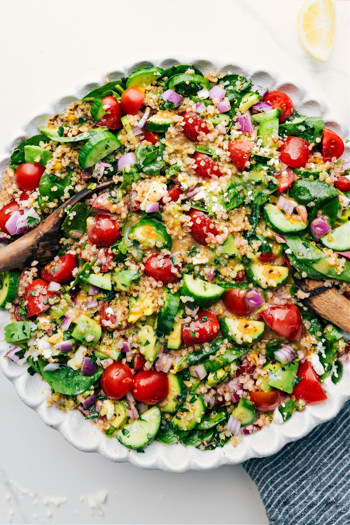 The Best Quinoa Salad Recipe Quinoa Salad fully dressed and tossed in a bowl, ready to enjoy.