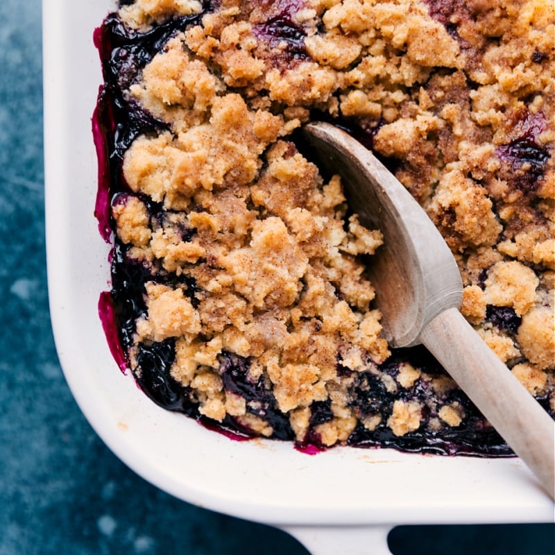 Up close image of a scoop of Blueberry Cobbler being taken out