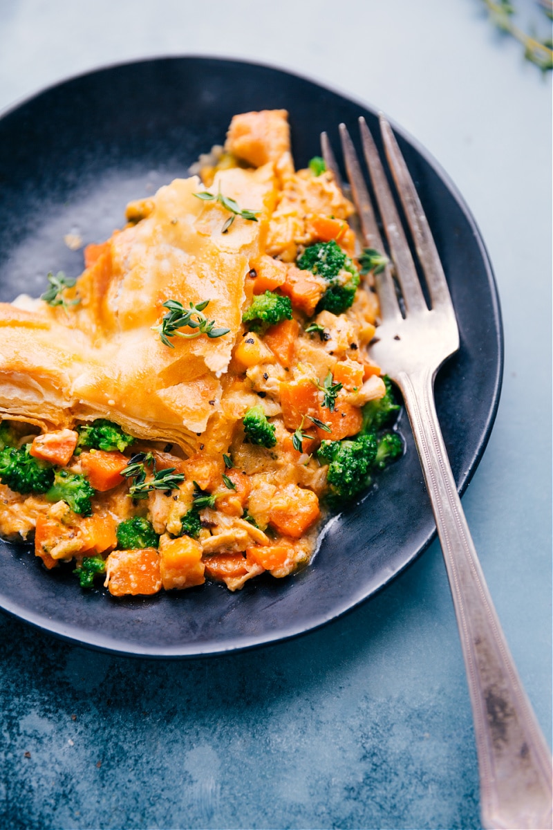 Up close overhead image of the Broccoli Cheddar Pot Pie on a plate ready to be eaten