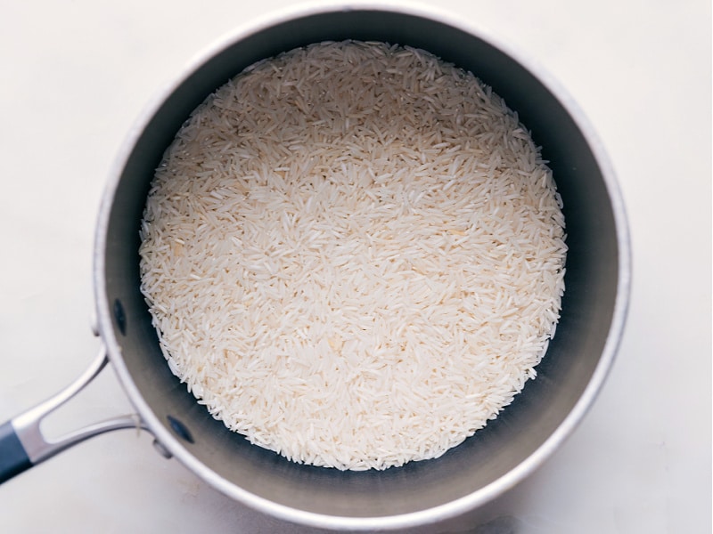 Image of the rice being added to the pot