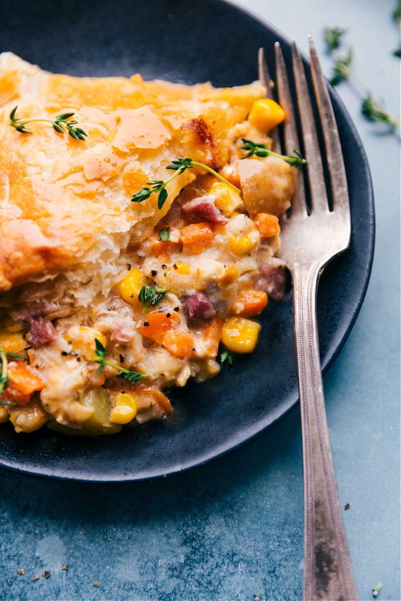 Up close image of Corn Chowder Pot Pie on a plate ready to be eaten