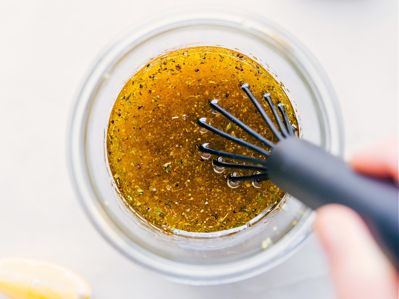 Process shots-- images of whisking the dressing together