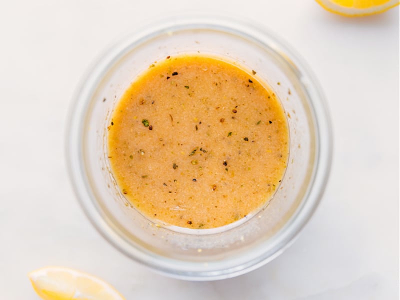 Image of the Lemon Vinaigrette in a jar ready to be served
