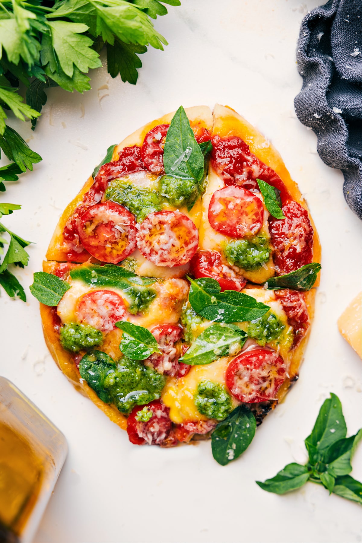 This simple, five-ingredient Pepperoni Naan Pizza can be prepped in 10 minutes or less, thanks to all the store-bought shortcuts we're employing. We start with store-bought naan and you're going to be amazed by how great of a stand-in it is for pizza dough -- especially since we're going for ease and speed with this recipe! Recipe via ChelseasMessyApron #dinner #quick #easy #simple #best #cheesy #lunch #30minutes #pepperoni #naan #pizza